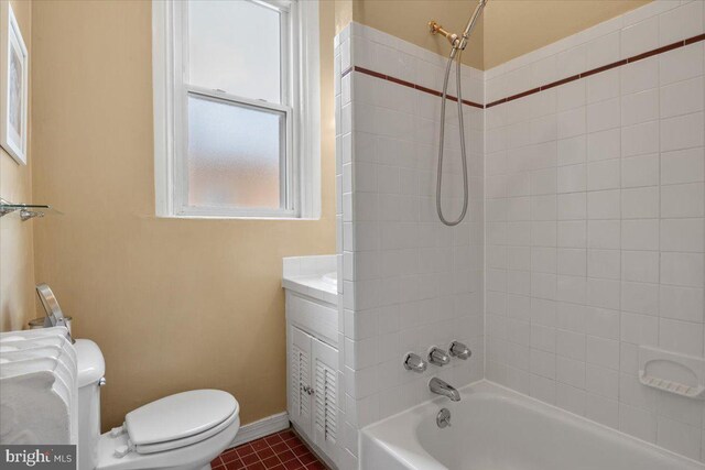 233 Rhode Island Ave NW, Washington, DC 20001 - bathroom with toilet, shower / bathtub combination, tile patterned floors, and baseboards