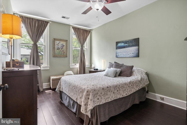 233 Rhode Island Ave NW, Washington, DC 20001 - bedroom featuring baseboards, dark wood-style floors, and a ceiling fan