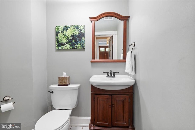 233 Rhode Island Ave NW, Washington, DC 20001 - half bathroom with toilet, vanity, and baseboards
