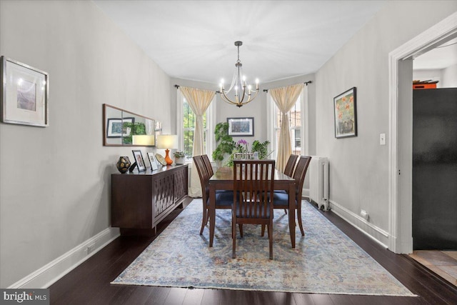 233 Rhode Island Ave NW, Washington, DC 20001 - dining area featuring radiator, a chandelier, dark wood-style floors, and baseboards