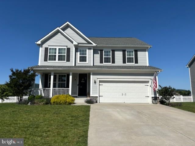 1419 Ramblewood Dr, Emmitsburg, MD 21727 - traditional-style home with concrete driveway, an attached garage, and covered porch