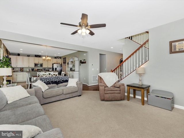 1419 Ramblewood Dr, Emmitsburg, MD 21727 - carpeted living area featuring baseboards, stairs, ceiling fan, a chandelier, and recessed lighting