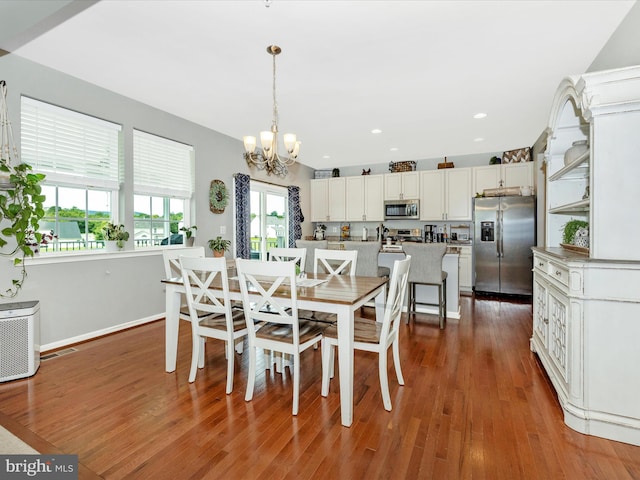 1419 Ramblewood Dr, Emmitsburg, MD 21727 - dining area featuring a chandelier, wood finished floors, baseboards, and recessed lighting