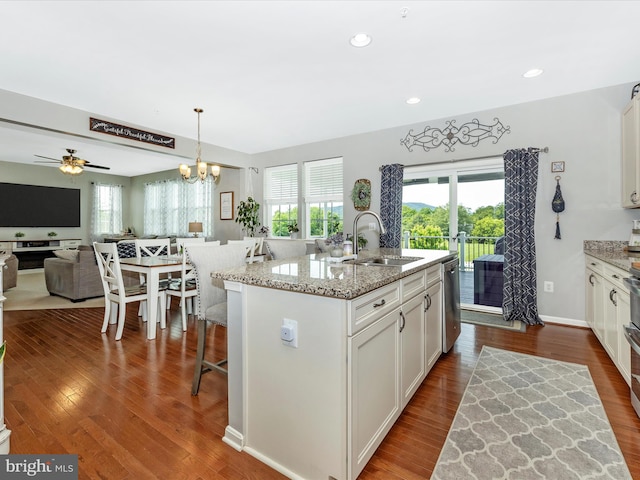 1419 Ramblewood Dr, Emmitsburg, MD 21727 - kitchen featuring a sink, a kitchen breakfast bar, an island with sink, white cabinets, and open floor plan