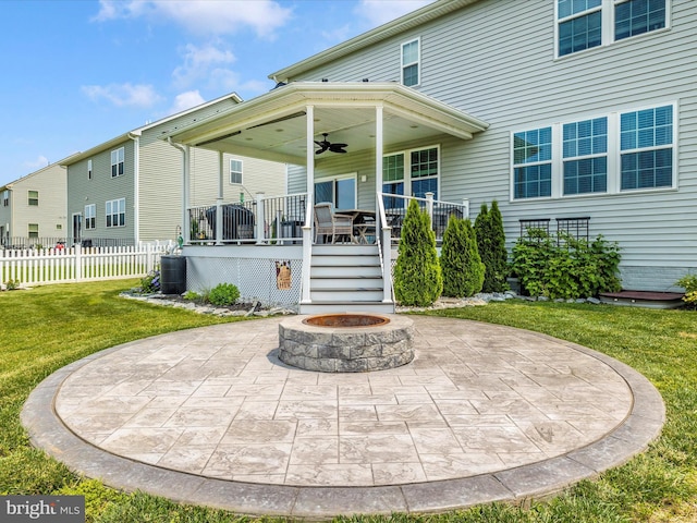 1419 Ramblewood Dr, Emmitsburg, MD 21727 - rear view of property with a ceiling fan, an outdoor fire pit, a patio area, and central AC
