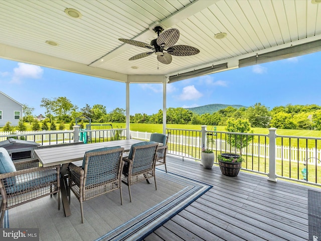 1419 Ramblewood Dr, Emmitsburg, MD 21727 - wooden terrace with ceiling fan, outdoor dining space, and view of scattered trees