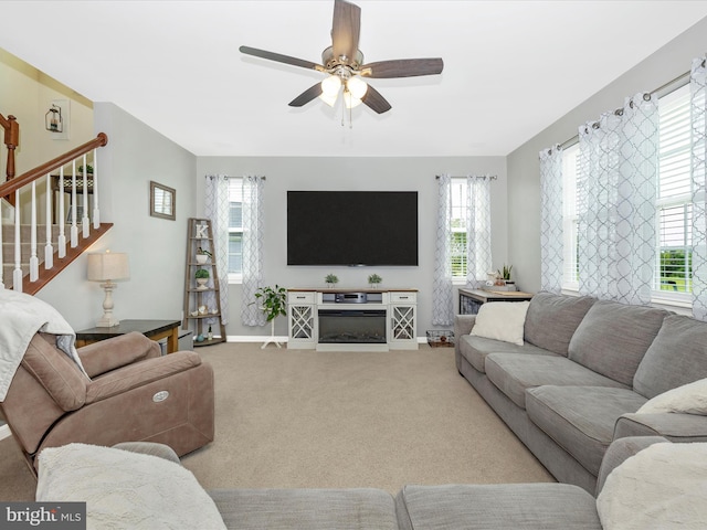 1419 Ramblewood Dr, Emmitsburg, MD 21727 - carpeted living room with plenty of natural light, stairway, ceiling fan, and baseboards