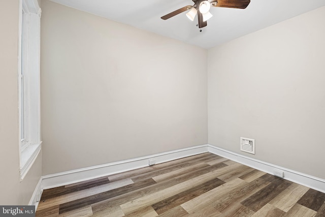 2729 W Seltzer St, Philadelphia, PA 19132 - spare room with ceiling fan, wood finished floors, and baseboards