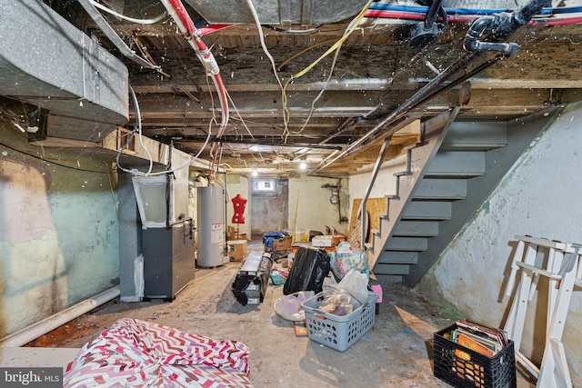 2729 W Seltzer St, Philadelphia, PA 19132 - basement with water heater, heating unit, stairway, and gas meter