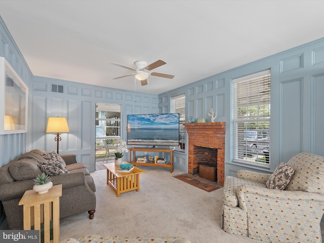 16 Delaware Ave, Rehoboth Beach, DE 19971 - living room featuring a decorative wall, carpet floors, a ceiling fan, and a fireplace