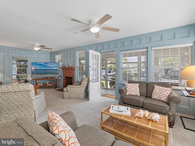 16 Delaware Ave, Rehoboth Beach, DE 19971 - carpeted living area with a ceiling fan and a brick fireplace