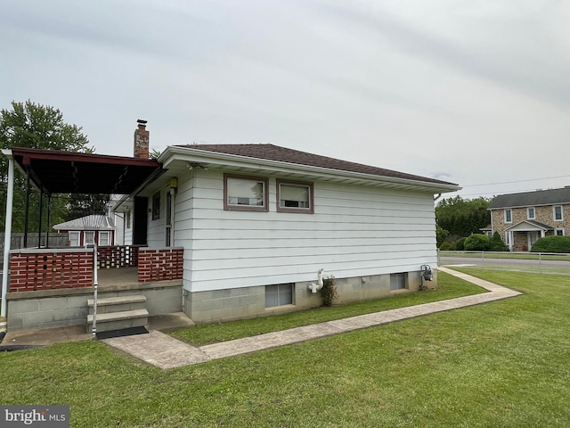 210 Potomac St, Cumberland, MD 21502 - view of side of property featuring a yard and a chimney