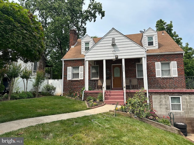 3924 Nicholson St, Hyattsville, MD 20782 - view of front of property featuring brick siding, a porch, and a chimney