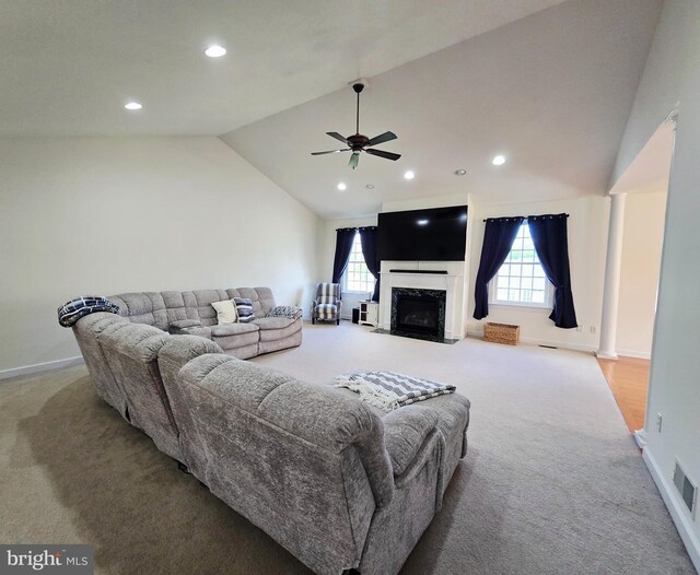 7677 Green Ridge Ln, Abbottstown, PA 17301 - carpeted living room with vaulted ceiling, a ceiling fan, recessed lighting, baseboards, and a premium fireplace