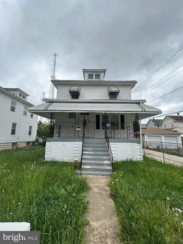 5258 Saint Charles Ave, Baltimore, MD 21215 - american foursquare style home featuring covered porch