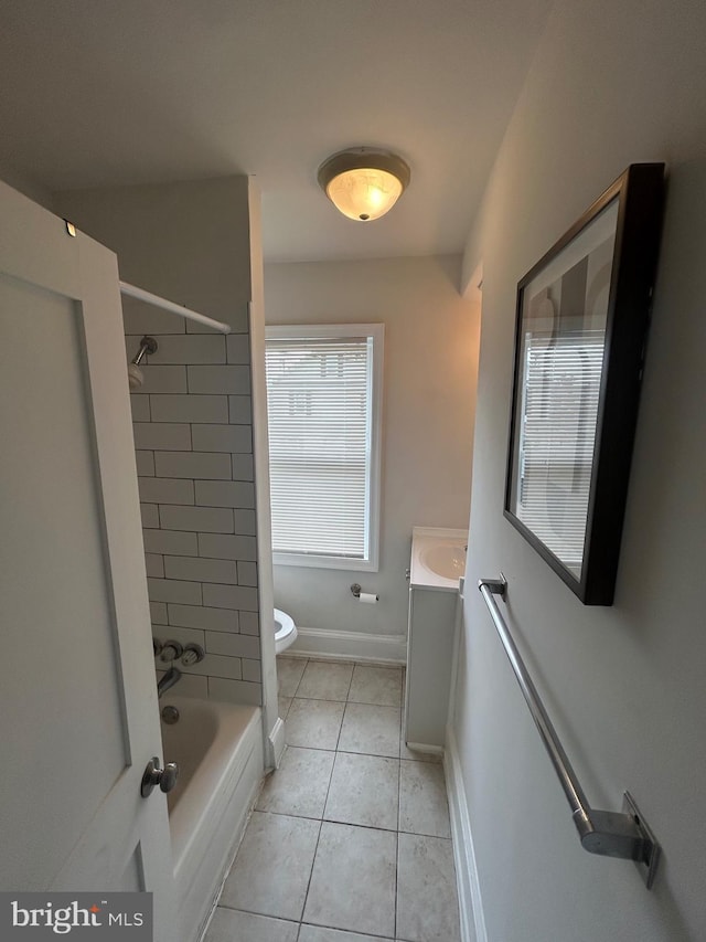 5258 Saint Charles Ave, Baltimore, MD 21215 - bathroom featuring toilet, vanity, tile patterned floors, bathtub / shower combination, and baseboards