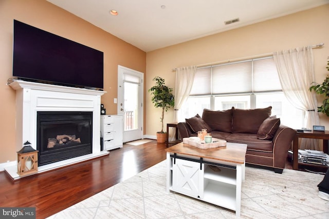 605 N Atlantic Ave Unit 204, Collingswood, NJ 08108 - living area with wood finished floors and a glass covered fireplace
