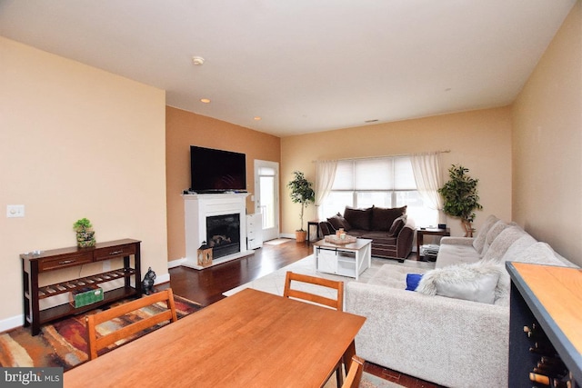 605 N Atlantic Ave Unit 204, Collingswood, NJ 08108 - living area featuring wood finished floors, a fireplace with raised hearth, baseboards, and recessed lighting