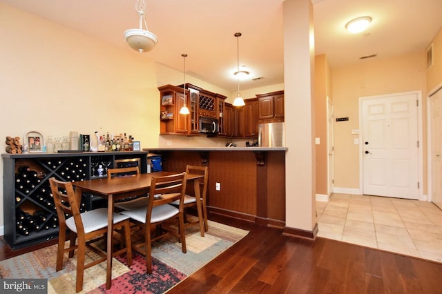 605 N Atlantic Ave Unit 204, Collingswood, NJ 08108 - dining space with wood finished floors and baseboards
