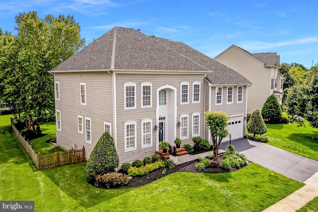 42863 Glyndebourne Ct, Broadlands, VA 20148 - view of front of house with driveway, an attached garage, and roof with shingles