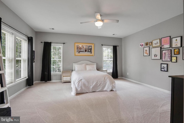 42863 Glyndebourne Ct, Broadlands, VA 20148 - bedroom with carpet, multiple windows, baseboards, and a ceiling fan