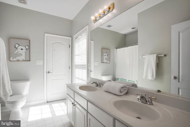 42863 Glyndebourne Ct, Broadlands, VA 20148 - bathroom featuring toilet, tile patterned flooring, and double vanity
