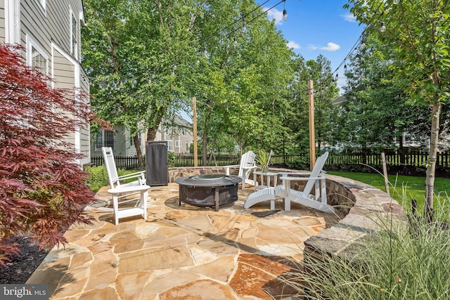 42863 Glyndebourne Ct, Broadlands, VA 20148 - view of patio with a fire pit