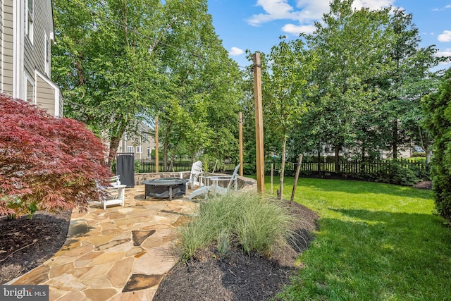 42863 Glyndebourne Ct, Broadlands, VA 20148 - view of yard featuring an outdoor fire pit and a patio
