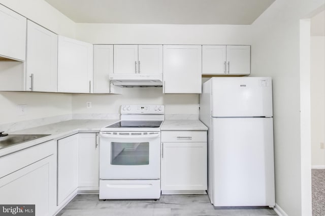 6952 Hanover Pkwy Unit 300, Greenbelt, MD 20770 - kitchen featuring white appliances, under cabinet range hood, white cabinets, and light countertops
