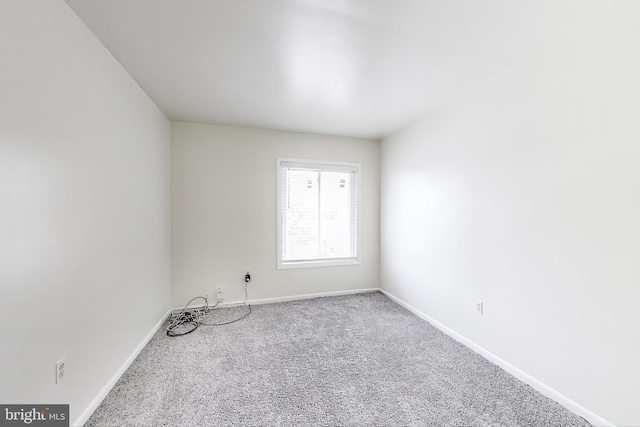 6952 Hanover Pkwy Unit 300, Greenbelt, MD 20770 - carpeted spare room featuring baseboards