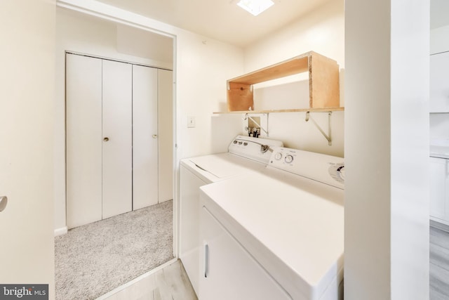6952 Hanover Pkwy Unit 300, Greenbelt, MD 20770 - laundry room featuring washer and clothes dryer