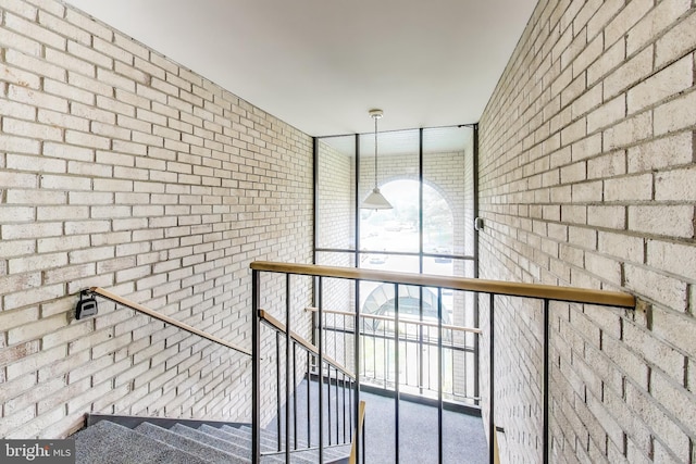 6952 Hanover Pkwy Unit 300, Greenbelt, MD 20770 - staircase with brick wall