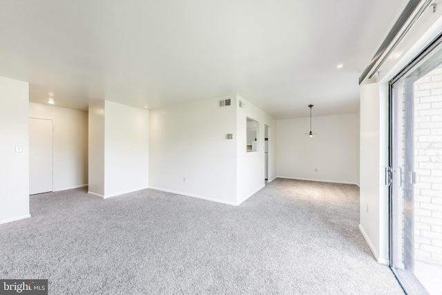 6952 Hanover Pkwy Unit 300, Greenbelt, MD 20770 - spare room featuring light colored carpet, baseboards, and recessed lighting