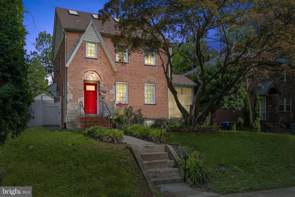 5114 Edmondson Ave, Baltimore, MD 21229 - tudor home featuring brick siding and roof with shingles