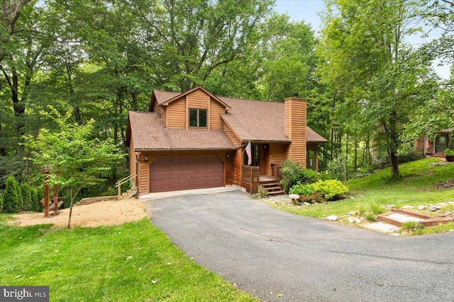 6816 Balmoral Ct, New Market, MD 21774 - view of front of property with driveway, a chimney, roof with shingles, and a garage