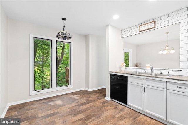 6816 Balmoral Ct, New Market, MD 21774 - kitchen with black dishwasher, a sink, healthy amount of natural light, baseboards, and recessed lighting