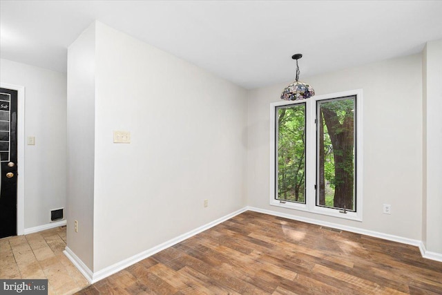 6816 Balmoral Ct, New Market, MD 21774 - unfurnished dining area with baseboards