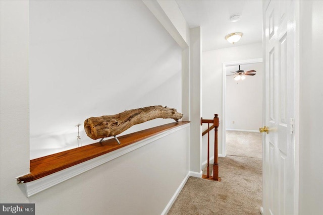6816 Balmoral Ct, New Market, MD 21774 - hallway featuring carpet floors, baseboards, and an upstairs landing