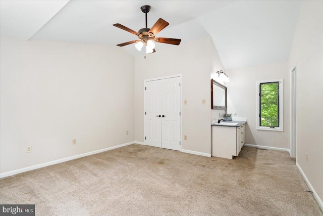 6816 Balmoral Ct, New Market, MD 21774 - unfurnished bedroom with a sink, light colored carpet, baseboards, high vaulted ceiling, and a ceiling fan