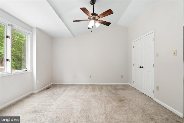 6816 Balmoral Ct, New Market, MD 21774 - spare room featuring lofted ceiling, carpet floors, ceiling fan, and baseboards