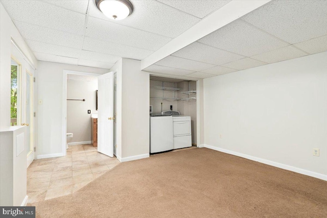 6816 Balmoral Ct, New Market, MD 21774 - unfurnished bedroom featuring washing machine and clothes dryer, light colored carpet, a drop ceiling, connected bathroom, and baseboards