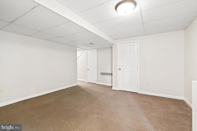 6816 Balmoral Ct, New Market, MD 21774 - finished below grade area featuring a paneled ceiling, carpet floors, and baseboards