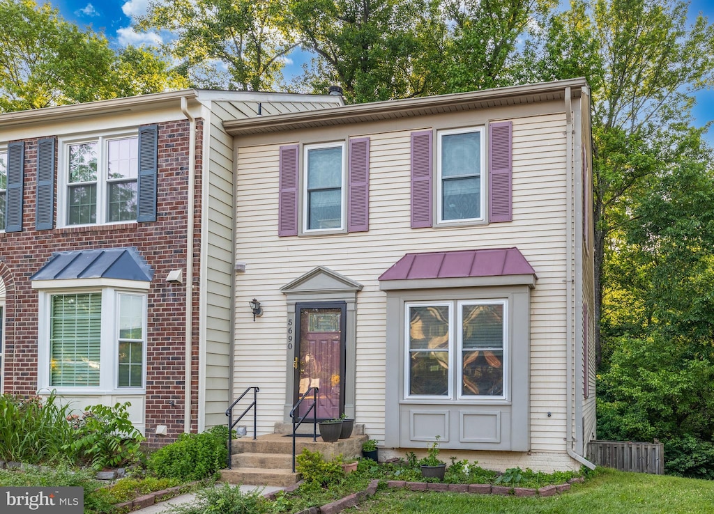 5690 Chapel Run Ct, Centreville, VA 20120 - view of property featuring a standing seam roof, metal roof, and brick siding