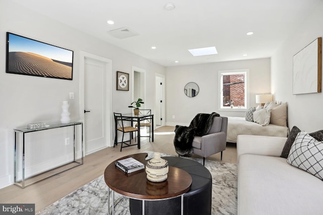 1746 Lanier Pl NW Unit 2, Washington, DC 20009 - living area with light wood-style flooring, a skylight, recessed lighting, and baseboards