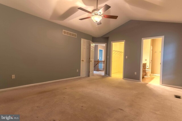 8 Spur Ridge Ct, Newark, DE 19702 - unfurnished bedroom featuring a spacious closet, light carpet, a closet, lofted ceiling, and ensuite bath