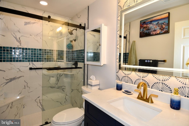 11839 Shire Ct Unit 31D, Reston, VA 20191 - bathroom with toilet, a marble finish shower, vanity, recessed lighting, and backsplash