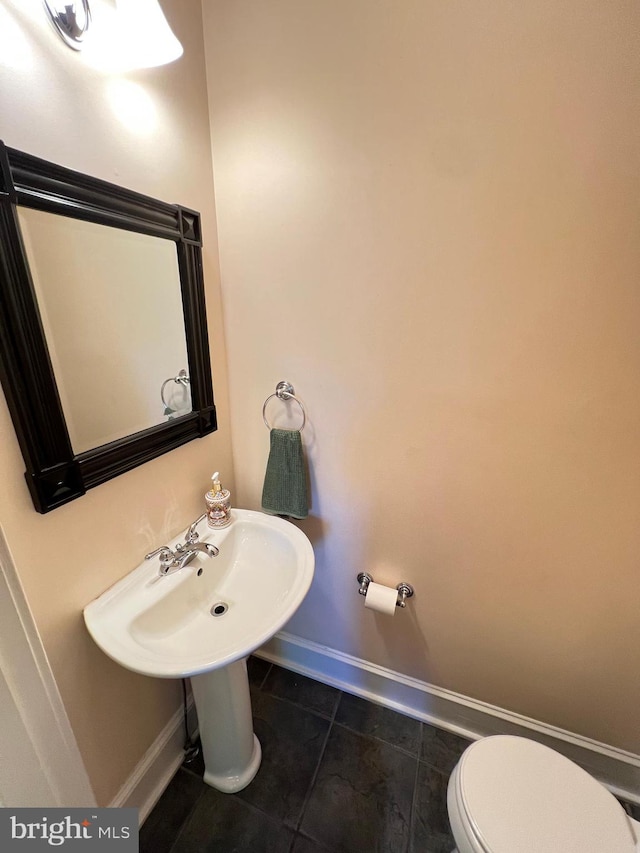 6206 Pinehurst Rd, Baltimore, MD 21212 - bathroom with baseboards, tile patterned floors, and toilet