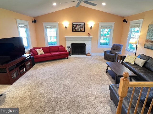 6206 Pinehurst Rd, Baltimore, MD 21212 - carpeted living room with vaulted ceiling, a fireplace, a ceiling fan, recessed lighting, and healthy amount of natural light