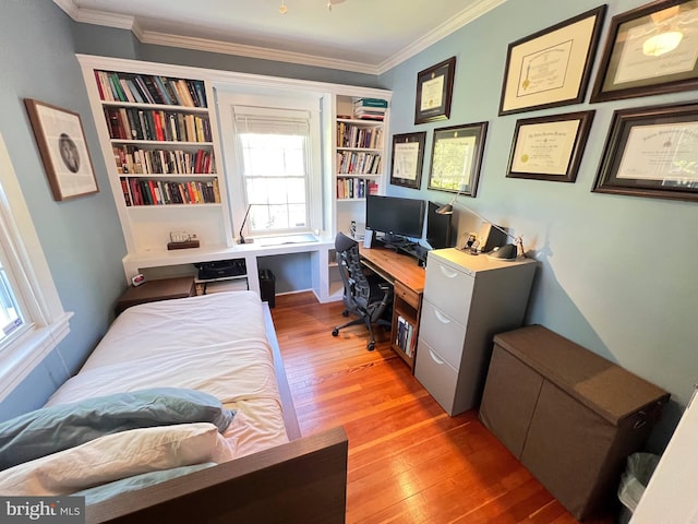 6206 Pinehurst Rd, Baltimore, MD 21212 - bedroom with light wood-style flooring, crown molding, multiple windows, and a desk