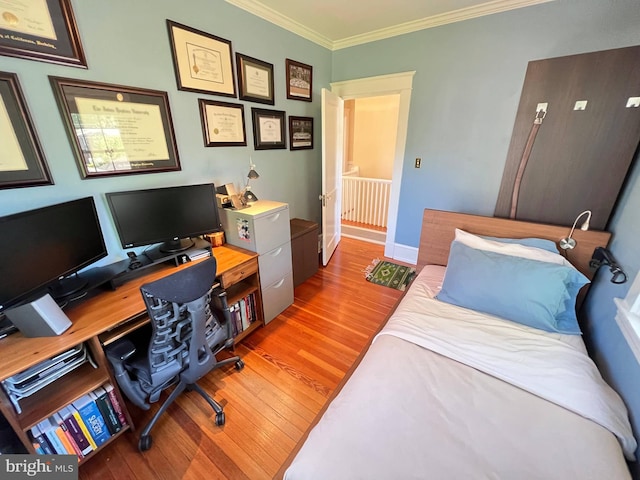 6206 Pinehurst Rd, Baltimore, MD 21212 - bedroom with ornamental molding, wood finished floors, an office area, and baseboards
